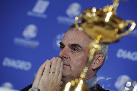 Paul McGinley of Ireland reacts near the Ryder Cup during a news conference after being named the European Ryder Cup captain at the St. Regi Paul McGinley of Ireland reacts near the Ryder Cup during a news conference after being named the European Ryder Cup captain at the St. Regi