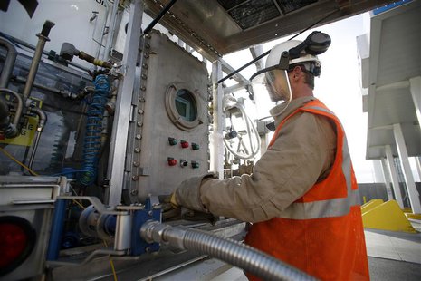 Chase Thornley logs the activity at a LNG terminal station at a Blu LNG filling station in Salt Lake City, Utah, March 13, 2013. ENN Group C Chase Thornley logs the activity at a LNG terminal station at a Blu LNG filling station in Salt Lake City, Utah, March 13, 2013. ENN Group C