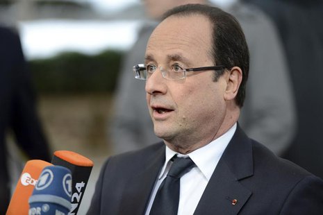 France's President Francois Hollande arrives at the European Union (EU) council headquarters for an EU leaders summit in Brussels March 14, France's President Francois Hollande arrives at the European Union (EU) council headquarters for an EU leaders summit in Brussels March 14,