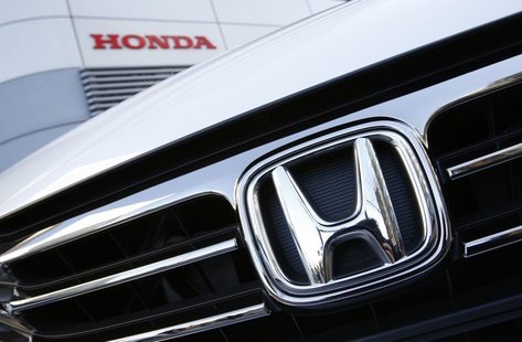 A Honda Odyssey car is displayed outside Honda Motor Co's showroom in Tokyo January 31, 2013. REUTERS/Issei Kato A Honda Odyssey car is displayed outside Honda Motor Co's showroom in Tokyo January 31, 2013. REUTERS/Issei Kato
