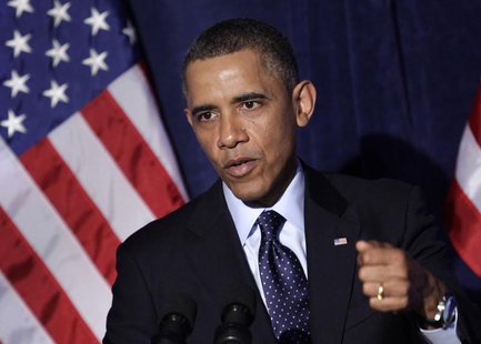 U.S. President Barack Obama delivers remarks at the Organizing for Action dinner in Washington, March 13, 2013. REUTERS/Yuri Gripas U.S. President Barack Obama delivers remarks at the Organizing for Action dinner in Washington, March 13, 2013. REUTERS/Yuri Gripas