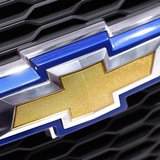 A Chevrolet logo is seen on a car displayed on the exhibition stand of Chevrolet during the first media day of the 80th Geneva Car Show at t A Chevrolet logo is seen on a car displayed on the exhibition stand of Chevrolet during the first media day of the 80th Geneva Car Show at t
