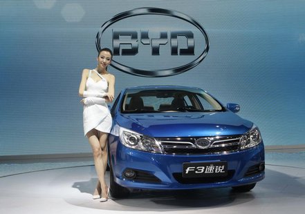 A model stands next to China's BYD F3 at Auto China 2012 in Beijing April 24, 2012. REUTERS/Jason Lee A model stands next to China's BYD F3 at Auto China 2012 in Beijing April 24, 2012. REUTERS/Jason Lee