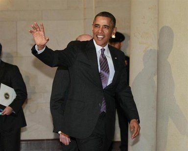 President Barack Obama walks between meetings with U.S. Senate Republicans and House Democrats on the budget on Capitol Hill in Washington M President Barack Obama walks between meetings with U.S. Senate Republicans and House Democrats on the budget on Capitol Hill in Washington M