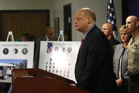 Arizona Attorney General Tom Horne speaks about weapons and drugs seized from the Mexican Sinaloa cartel during "Operation Pipeline Express" Arizona Attorney General Tom Horne speaks about weapons and drugs seized from the Mexican Sinaloa cartel during "Operation Pipeline Express"