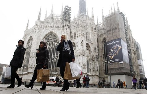 People walk past the Duomo cathedral in downtown Milan January 11, 2013. REUTERS/Alessandro Garofalo People walk past the Duomo cathedral in downtown Milan January 11, 2013. REUTERS/Alessandro Garofalo