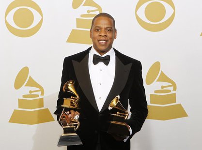 Jay-Z poses with the awards he won for Best Rap Performance, Best Rap/Sung Collaboration and Best Rap Song backstage at the 55th annual Gram Jay-Z poses with the awards he won for Best Rap Performance, Best Rap/Sung Collaboration and Best Rap Song backstage at the 55th annual Gram