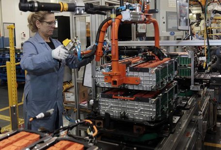 A Ford Motor production worker assembles batteries for Ford electric and hybrid vehicles at the Ford Rawsonville Assembly Plant in Ypsilanti A Ford Motor production worker assembles batteries for Ford electric and hybrid vehicles at the Ford Rawsonville Assembly Plant in Ypsilanti