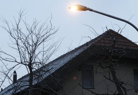 The closed apartment of a healer and music teacher is seen in Bern March 14, 2013, Police tried to bring the man to court as he barricaded h The closed apartment of a healer and music teacher is seen in Bern March 14, 2013, Police tried to bring the man to court as he barricaded h