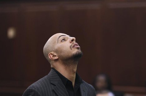 Algerian-born Ahmed Ferhani stands before a judge during his arraignment in Manhattan criminal court in New York May 12, 2011. REUTERS/Lucas Algerian-born Ahmed Ferhani stands before a judge during his arraignment in Manhattan criminal court in New York May 12, 2011. REUTERS/Lucas