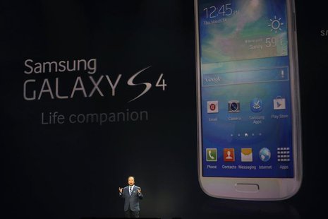 JK Shin, President and head of IT and Mobile Communication Division, introduces Samsung Electronics Co's latest Galaxy S4 phone during its l JK Shin, President and head of IT and Mobile Communication Division, introduces Samsung Electronics Co's latest Galaxy S4 phone during its l