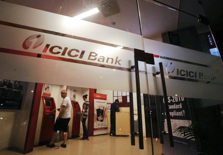 Customers use ATM machines at an ICICI Bank branch in Mumbai January 30, 2013. REUTERS/Vivek Prakash Customers use ATM machines at an ICICI Bank branch in Mumbai January 30, 2013. REUTERS/Vivek Prakash
