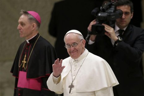 Pope Francis I arrives in the Paul VI hall during an audience for members of the media, at the Vatican March 16, 2013. REUTERS/Max Rossi Pope Francis I arrives in the Paul VI hall during an audience for members of the media, at the Vatican March 16, 2013. REUTERS/Max Rossi