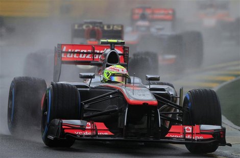 McLaren Formula One driver Sergio Perez of Mexico drives during the qualifying session of the Australian F1 Grand Prix at the Albert Park ci McLaren Formula One driver Sergio Perez of Mexico drives during the qualifying session of the Australian F1 Grand Prix at the Albert Park ci