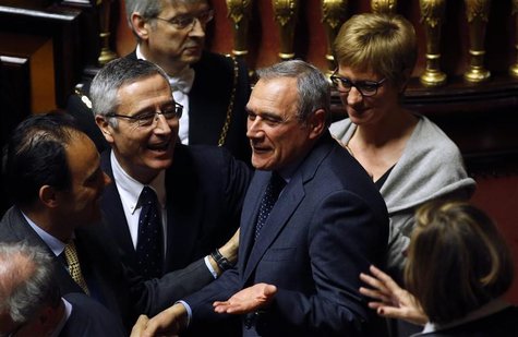 Piero Grasso (C) is congratulated after the vote electing him as the new Senate president at the Senate in Rome March 16, 2013. REUTERS/Remo Piero Grasso (C) is congratulated after the vote electing him as the new Senate president at the Senate in Rome March 16, 2013. REUTERS/Remo