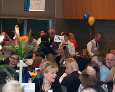 A bid is made during the live auction at the 2013 Culinary Cabaret in Hudsonville's Pinnacle Center on Mar. 7, 2013. (photo courtesy Holland Hospital) A bid is made during the live auction at the 2013 Culinary Cabaret in Hudsonville's Pinnacle Center on Mar. 7, 2013. (photo courtesy Holland Hospital)