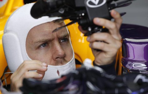 Red Bull Formula One driver Sebastian Vettel of Germany looks on in his car during the third practice session of the Australian F1 Grand Pri Red Bull Formula One driver Sebastian Vettel of Germany looks on in his car during the third practice session of the Australian F1 Grand Pri