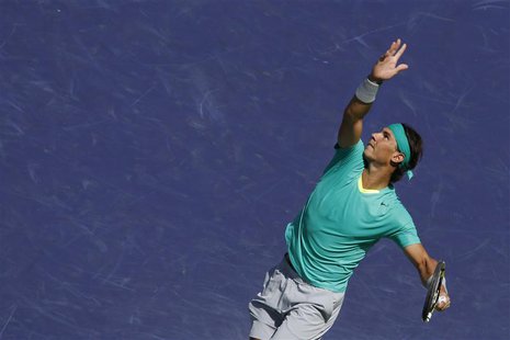 Rafael Nadal of Spain serves against Tomas Berdych of the Czech Republic during their men's singles semifinal match at the BNP Paribas Open Rafael Nadal of Spain serves against Tomas Berdych of the Czech Republic during their men's singles semifinal match at the BNP Paribas Open