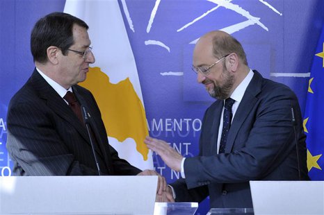 Cyprus President Nicos Anastasiades (L) and European President Martin Schulz give statements to the media at the European Parliament in Brus Cyprus President Nicos Anastasiades (L) and European President Martin Schulz give statements to the media at the European Parliament in Brus