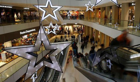 People walk through a shopping mall in the western Austrian city of Innsbruck December 20, 2012. REUTERS/Dominic Ebenbichler People walk through a shopping mall in the western Austrian city of Innsbruck December 20, 2012. REUTERS/Dominic Ebenbichler