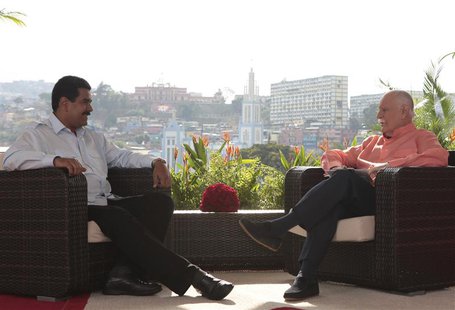 Venezuela's acting President Nicolas Maduro (L) speaks during an interview in Caracas, March 16, 2013, in this handout photo provided by the Venezuela's acting President Nicolas Maduro (L) speaks during an interview in Caracas, March 16, 2013, in this handout photo provided by the