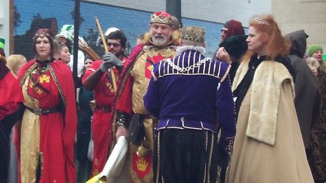 Renaissance Fair King and his court wait their turn to join the parade. Renaissance Fair King and his court wait their turn to join the parade.