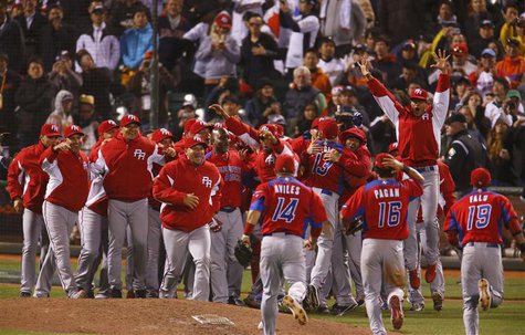 Puerto Rico players celebrate after defeating Japan in their semi-final World Baseball Classic game in San Francisco, California, March 17, Puerto Rico players celebrate after defeating Japan in their semi-final World Baseball Classic game in San Francisco, California, March 17,