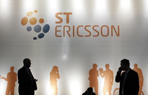 People walk past an ST-Ericsson stand at the Mobile World Congress in Barcelona February 25, 2013. REUTERS/Albert Gea People walk past an ST-Ericsson stand at the Mobile World Congress in Barcelona February 25, 2013. REUTERS/Albert Gea