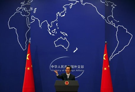 China's Foreign Ministry spokesman Hong Lei asks journalists for questions during a news conference in Beijing July 7, 2011. REUTERS/David G China's Foreign Ministry spokesman Hong Lei asks journalists for questions during a news conference in Beijing July 7, 2011. REUTERS/David G