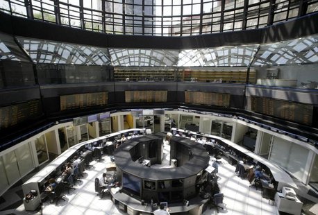 Mexico's stock exchange employees work at their desks in Mexico City April 5, 2010. REUTERS/Henry Romero Mexico's stock exchange employees work at their desks in Mexico City April 5, 2010. REUTERS/Henry Romero