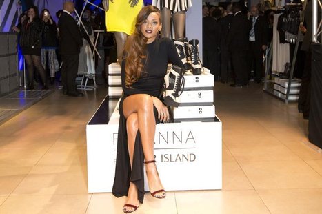 Singer Rihanna attends the launch of her collection "Rihanna for River Island" at a store in central London March 4, 2013. REUTERS/Neil Hall Singer Rihanna attends the launch of her collection "Rihanna for River Island" at a store in central London March 4, 2013. REUTERS/Neil Hall