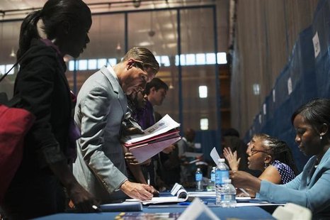 Job seekers speak to recruiters at a job fair sponsored by the New York Department of Labor in New York, June 7, 2012. REUTERS/Keith Bedford Job seekers speak to recruiters at a job fair sponsored by the New York Department of Labor in New York, June 7, 2012. REUTERS/Keith Bedford
