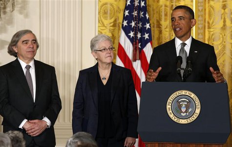 U.S. President Barack Obama stands next to two new nominees for senior positions in his Administration while in the East Room of the White H U.S. President Barack Obama stands next to two new nominees for senior positions in his Administration while in the East Room of the White H