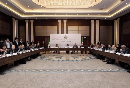 Syrian Opposition Coalition members and Syrian National Coalition members attend a meeting in Istanbul March 18, 2013. REUTERS/Osman Orsal Syrian Opposition Coalition members and Syrian National Coalition members attend a meeting in Istanbul March 18, 2013. REUTERS/Osman Orsal
