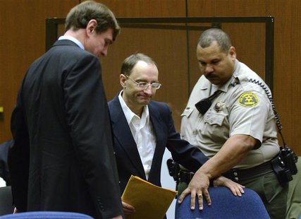 Defendant Christian Gerhartsreiter (C) from Germany arrives for the start of his murder trial at the Los Angeles Superior Court in Los Angel Defendant Christian Gerhartsreiter (C) from Germany arrives for the start of his murder trial at the Los Angeles Superior Court in Los Angel