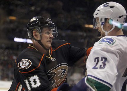 Anaheim Ducks right wing Corey Perry (10) attempts to incite Vancouver Canucks defenseman Alexander Edler (23) of Sweden into a fight, but P Anaheim Ducks right wing Corey Perry (10) attempts to incite Vancouver Canucks defenseman Alexander Edler (23) of Sweden into a fight, but P