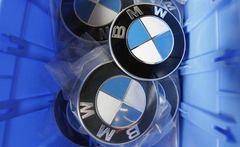 BMW luxury car logos are pictured in a spare part store at a BMW garage in Niderwangen near Bern, May 24, 2012. REUTERS/Pascal Lauener BMW luxury car logos are pictured in a spare part store at a BMW garage in Niderwangen near Bern, May 24, 2012. REUTERS/Pascal Lauener