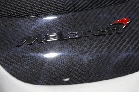 The McLaren P1 car is pictured during the second media day of the 83rd Geneva Car Show at the Palexpo Arena in Geneva March 6, 2013. REUTERS The McLaren P1 car is pictured during the second media day of the 83rd Geneva Car Show at the Palexpo Arena in Geneva March 6, 2013. REUTERS