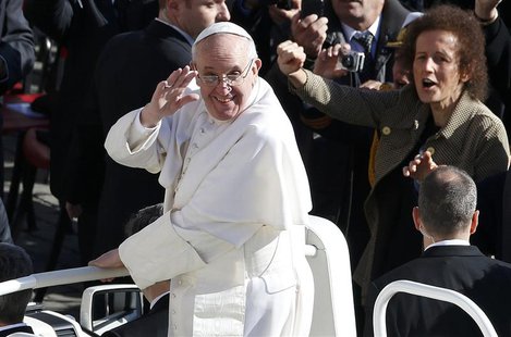 Pope Francis arrives in Saint Peter's Square for his inaugural mass at the Vatican, March 19, 2013. REUTERS/Stefano Rellandini Pope Francis arrives in Saint Peter's Square for his inaugural mass at the Vatican, March 19, 2013. REUTERS/Stefano Rellandini