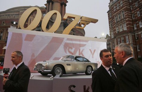 An Aston Martin car is displayed near television crews before guests arrive for the royal world premiere of the new 007 film "Skyfall" at th An Aston Martin car is displayed near television crews before guests arrive for the royal world premiere of the new 007 film "Skyfall" at th