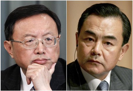A combination of two file photos shows then China's Foreign Minister Yang Jiechi (L) in Moscow February 22, 2013, and Wang Yi, then Ambassad A combination of two file photos shows then China's Foreign Minister Yang Jiechi (L) in Moscow February 22, 2013, and Wang Yi, then Ambassad