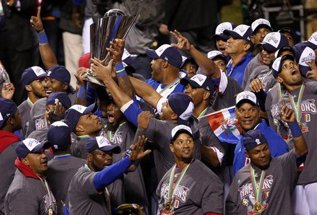 Dominican Republic players hold up the championship trophy after defeating Puerto Rico to win the their World Baseball Classic final in San Dominican Republic players hold up the championship trophy after defeating Puerto Rico to win the their World Baseball Classic final in San