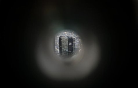 The headquarters of Germany's largest business bank, Deutsche Bank, is seen through a pair of tourist binoculars in Frankfurt January 31, 20 The headquarters of Germany's largest business bank, Deutsche Bank, is seen through a pair of tourist binoculars in Frankfurt January 31, 20
