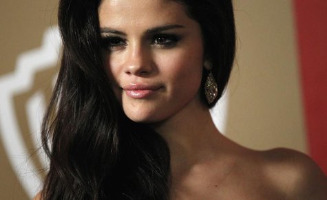 Actress Selena Gomez poses at the InStyle/Warner Bros. after party following the 70th annual Golden Globe Awards in Beverly Hills, Californi Actress Selena Gomez poses at the InStyle/Warner Bros. after party following the 70th annual Golden Globe Awards in Beverly Hills, Californi
