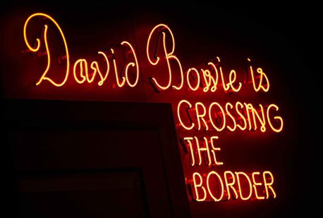 A neon sign is seen at the "David Bowie is" Exhibition at the Victoria and Albert Museum in London, March 20, 2013. REUTERS/Neil Hall A neon sign is seen at the "David Bowie is" Exhibition at the Victoria and Albert Museum in London, March 20, 2013. REUTERS/Neil Hall
