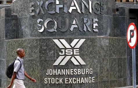 A man walks past the Johannesburg Stock Exchange building in Sandton December 6, 2012. REUTERS/Siphiwe Sibeko A man walks past the Johannesburg Stock Exchange building in Sandton December 6, 2012. REUTERS/Siphiwe Sibeko