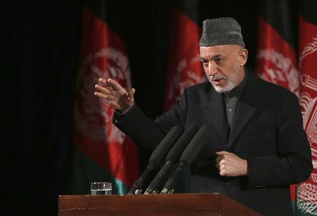 Afghan President Hamid Karzai gives a speech during an event to mark International Women's Day in Kabul March 10, 2013. REUTERS/Mohammad Ism Afghan President Hamid Karzai gives a speech during an event to mark International Women's Day in Kabul March 10, 2013. REUTERS/Mohammad Ism