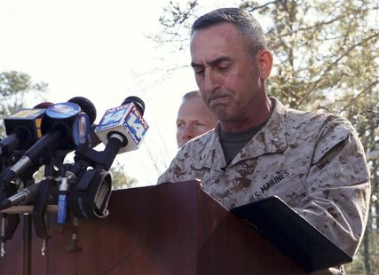 Brig. Gen. James W. Lukeman, 2nd Marine Division commanding general, offers his remarks and condolences outside the main gate of Marine Corp Brig. Gen. James W. Lukeman, 2nd Marine Division commanding general, offers his remarks and condolences outside the main gate of Marine Corp