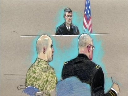 U.S. Army Major Nidal Malik Hasan (L) appears before the Fort Hood Chief Circuit Judge Colonel Gregory Gross (C-rear) with a military lawyer U.S. Army Major Nidal Malik Hasan (L) appears before the Fort Hood Chief Circuit Judge Colonel Gregory Gross (C-rear) with a military lawyer