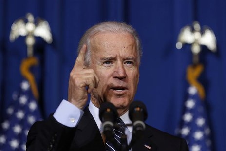 U.S. Vice President Joseph Biden talks before U.S. President Barack Obama signs the Violence Against Women Act while at the Department of In U.S. Vice President Joseph Biden talks before U.S. President Barack Obama signs the Violence Against Women Act while at the Department of In